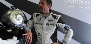 US Actor Patrick Dempsey, who drives the Porsche 911 RSR N° 77, looks on as he rests in his pit during the test day of the 82th Le Mans 24 hours endurance race, on June 1, 2014, in Le Mans, western France. Fifty-six cars with 168 drivers will participate on June 14 and 15 in the Le Mans 24-hours endurance race. AFP PHOTO / JEAN FRANCOIS MONIER